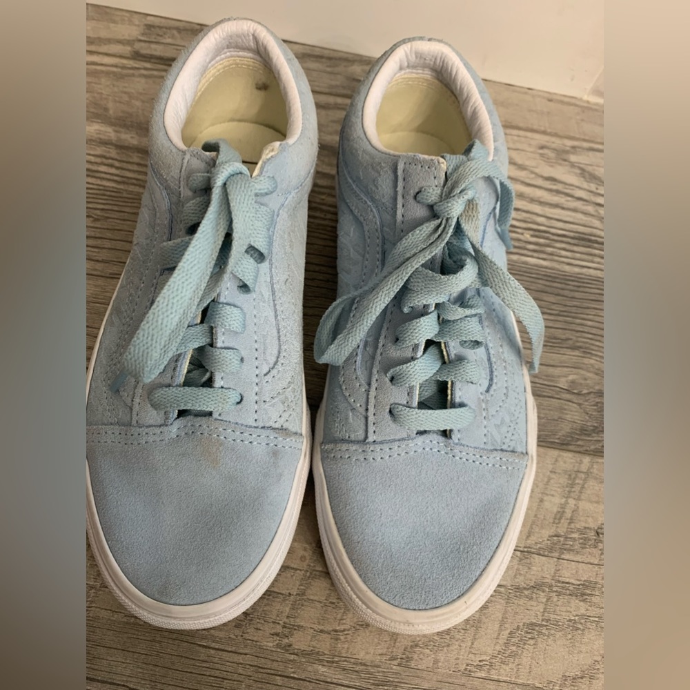Light Blue Vans with starlike texture on the sides